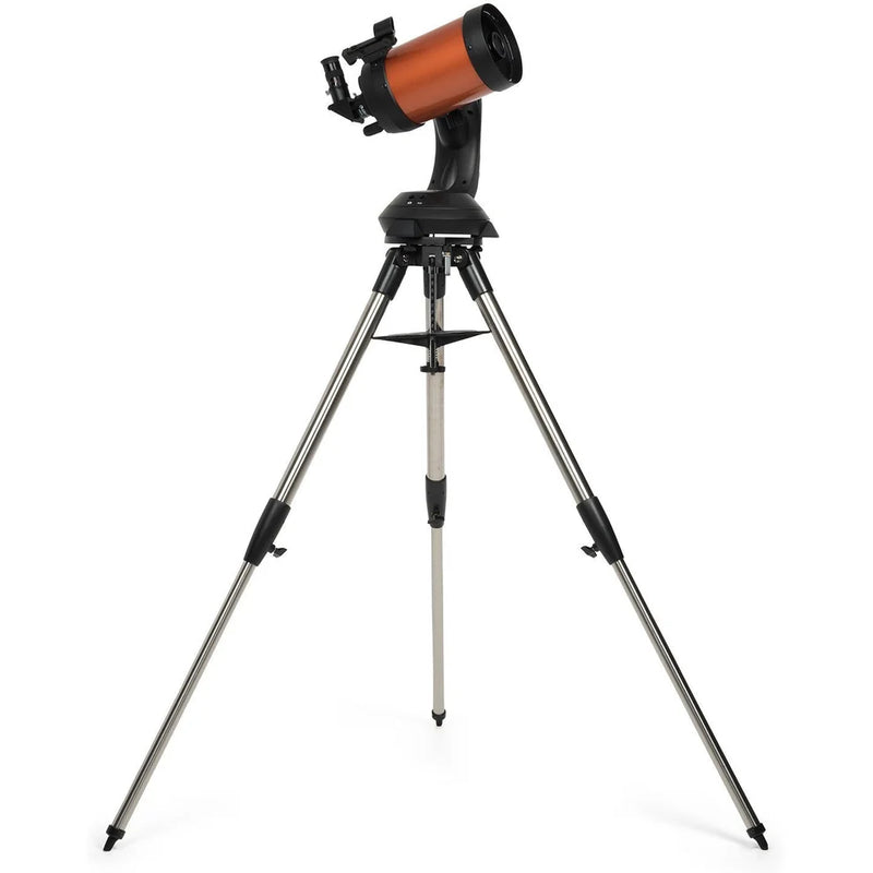 Celestron NexStar 5SE Schmidt-Cassegrain computerized telescope with tripod and optical tube for stargazing and astronomy.