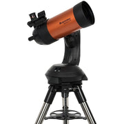Celestron NexStar 4SE Maksutov Schmidt-Cassegrain computerized telescope with tripod, black optical tube and electronic control panel.