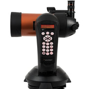 Celestron NexStar 4SE Maksutov Schmidt-Cassegrain computerized telescope with tripod and control panel, ready for stargazing.