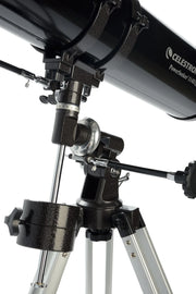 Celestron PowerSeeker 114EQ Newtonian telescope with equatorial mount, featuring optical tube and focusing eyepiece for astronomy.