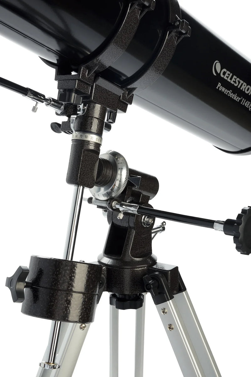 Celestron PowerSeeker 114EQ Newtonian telescope with equatorial mount, featuring optical tube and focusing eyepiece for astronomy.