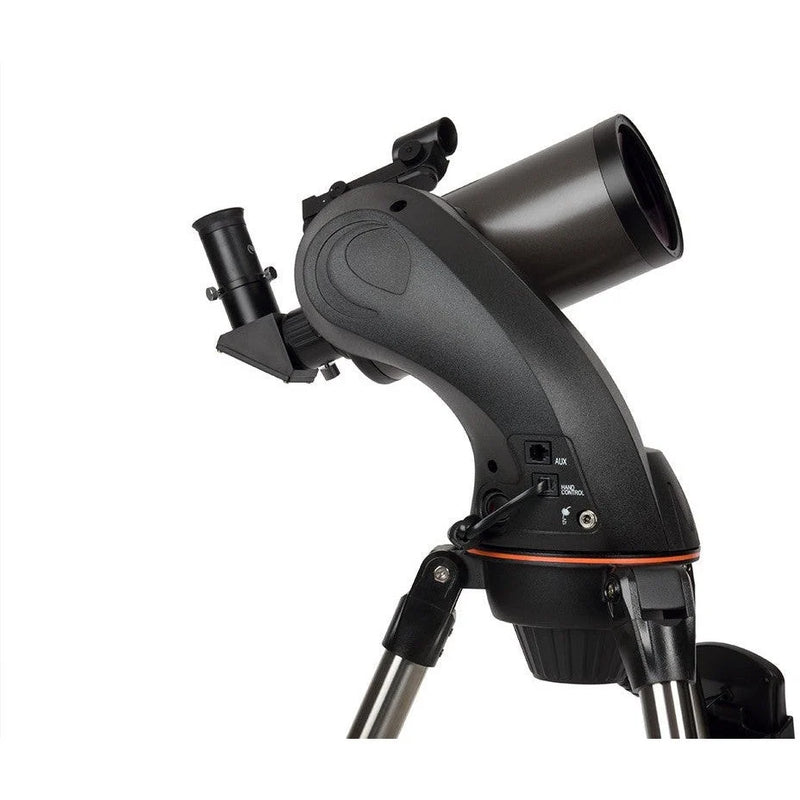 Celestron NexStar 90 SLT Maksutov Schmidt-Cassegrain computerized telescope setup with adjustable tripod and control panel.