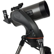Celestron NexStar 127 SLT Maksutov Schmidt-Cassegrain computerized telescope with tripod and control panel, ready for stargazing.