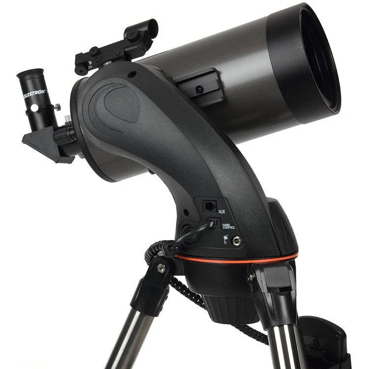 Celestron NexStar 127 SLT Maksutov Schmidt-Cassegrain computerized telescope with tripod and control panel, ready for stargazing.