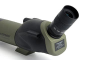 Celestron Ultima 65 spotting scope with 45-degree eyepiece, compact binocular-style optical device for nature and birdwatching.