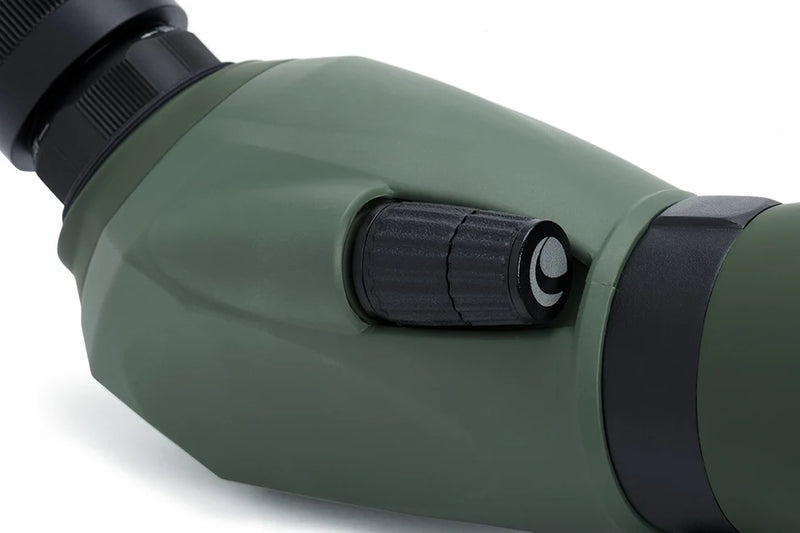 Celestron Regal M2 65 ED angled zoom spotting scope with adjustable eyepiece and sturdy tripod for nature viewing.