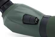 Celestron Regal M2 100 ED zoom spotting scope with adjustable eyepiece and sturdy tripod for detailed outdoor viewing.