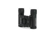 Celestron UpClose G2 8x21 roof binoculars with compact black design, showcased in box with focus on eyepieces and body details.