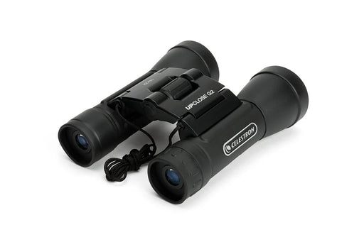 Celestron UpClose G2 16x32 roof binoculars with black body and textured grip, positioned on a white background.