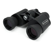Celestron UpClose G2 8x40 Porro binoculars with black rubber coating and textured focus wheel, shown in box packaging.