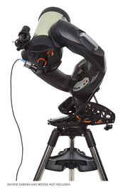 Celestron CPC Deluxe 800 EdgeHD Schmidt-Cassegrain computerized telescope set up indoors with optical tube and mount components visible.