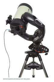 Celestron CPC 1100 GPS Schmidt-Cassegrain computerized telescope with tripod and control panel, ready for astronomical observation.