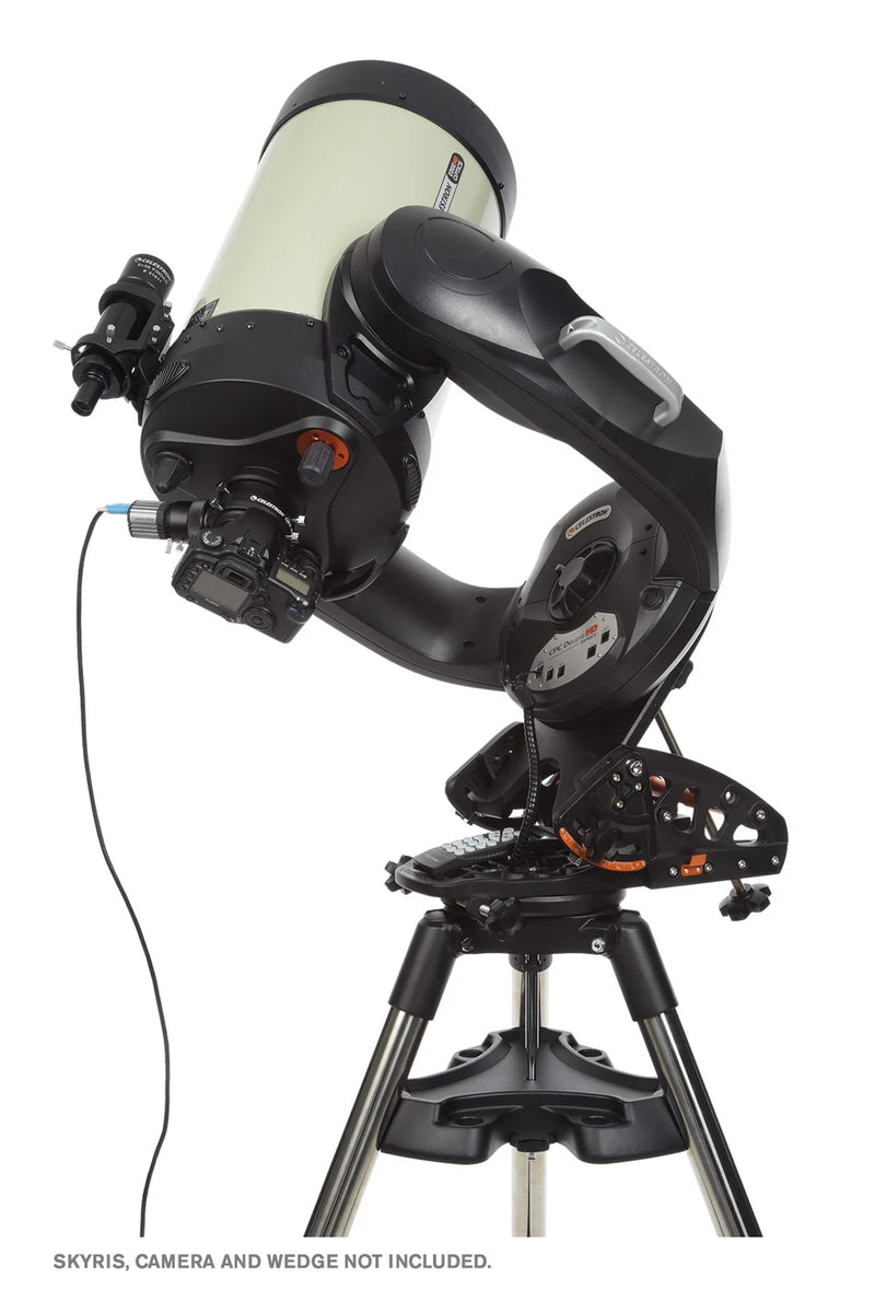 Celestron CPC Deluxe 1100 EdgeHD Schmidt-Cassegrain computerized telescope with tripod and optical accessories.