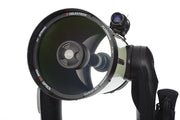 Celestron CPC Deluxe 1100 EdgeHD Schmidt-Cassegrain computerized telescope with tripod and accessories.