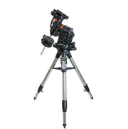 Celestron CGX 1100 EdgeHD Schmidt-Cassegrain reflector telescope set up outdoors on a mount with starry sky background