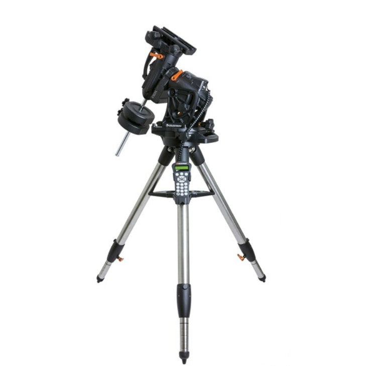 Celestron CGX 1100 EdgeHD Schmidt-Cassegrain reflector telescope set up outdoors on a mount with starry sky background