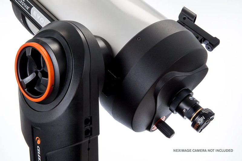Celestron NexStar Evolution 8" SCT Schmidt-Cassegrain telescope set up outdoors with mount and accessories visible.