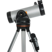 Celestron 114 LCM Newtonian reflector telescope with black metal optical tube and adjustable mount, designed for astronomical observation.
