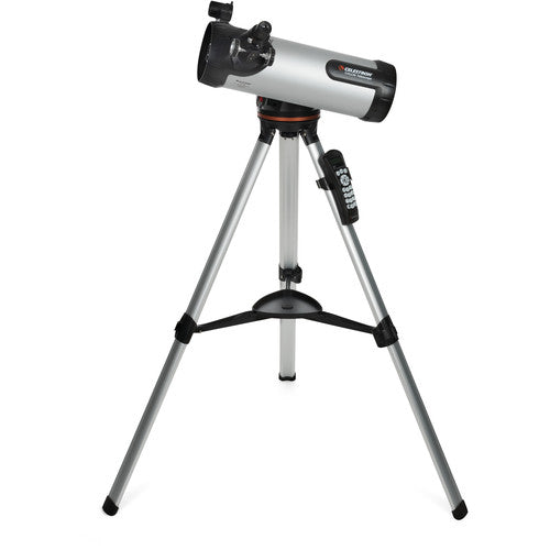 Celestron 114 LCM Newtonian reflector telescope with silver optical tube, mounted on adjustable tripod for astronomy viewing.