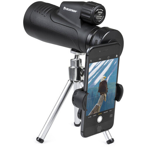 Celestron Outland X 20x50 binoculars with tripod and adapter, showing the compact design and adjustable eyepieces.