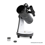 Celestron FirstScope accessory kit with telescope eyepieces, filters, and tools for enhancing astronomy observations.