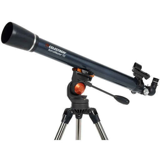 Celestron AstroMaster 70AZ refractor telescope set up outdoors with tripod and optical tube for stargazing and celestial observation.