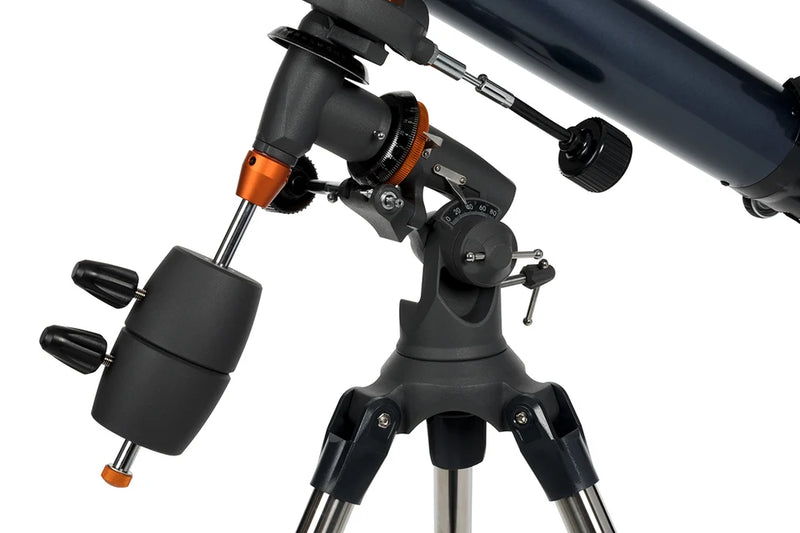 Celestron AstroMaster 90EQ refractor telescope set up outdoors, showing its optical tube, mount, and tripod for stargazing and astronomy.
