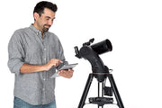 Celestron AstroFi 102 Wi-Fi Maksutov reflector telescope with optical tube and mounted eyepiece for stargazing and astronomy.