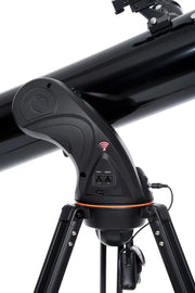 Celestron AstroFi 130 Wi-Fi Newtonian reflector telescope with tripod, showcasing its optical tube and control panel for stargazing.