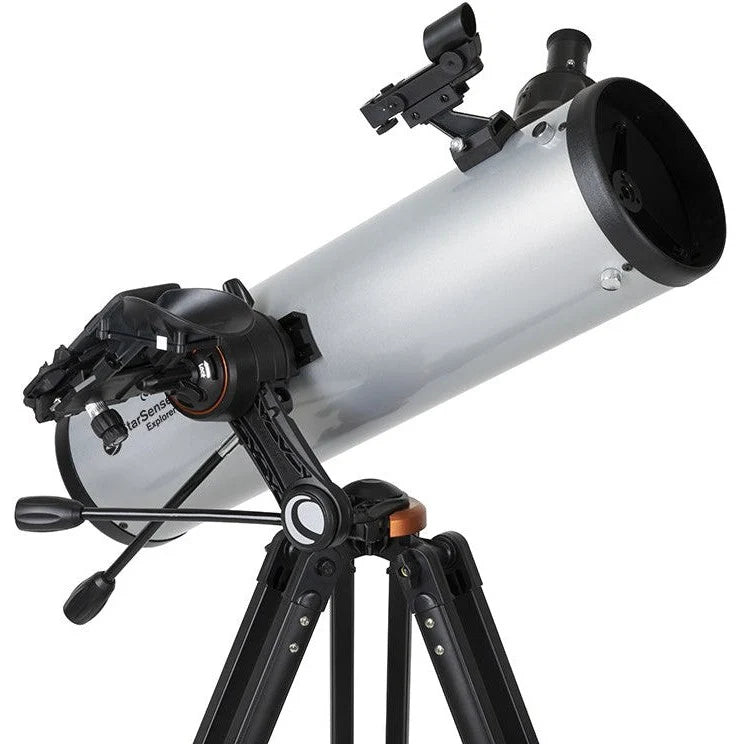 Celestron Starsense Explorer DX 130AZ reflector telescope with smartphone app, Newtonian design, mounted on an adjustable tripod.