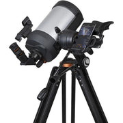 Celestron Starsense Explorer DX 5-inch SCT smartphone-enabled telescope with optical refractor design, mounted on tripod.