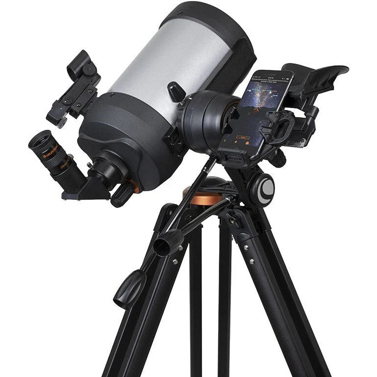 Celestron Starsense Explorer DX 5-inch SCT smartphone-enabled telescope with optical refractor design, mounted on tripod.