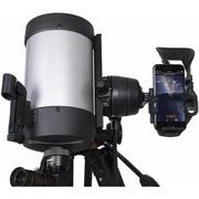 Celestron Starsense Explorer DX 5-inch SCT refractor telescope with smartphone app, mounted on a tripod for stargazing.