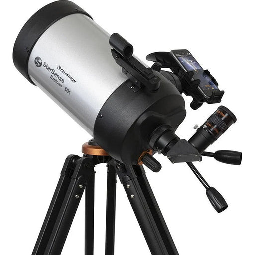 Celestron Starsense Explorer DX 5-inch SCT smartphone-enabled telescope with tripod and optical components visible.