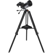 Celestron Starsense Explorer DX 5-inch SCT smartphone-enabled telescope with refractor design, mounted for stargazing and astronomy.