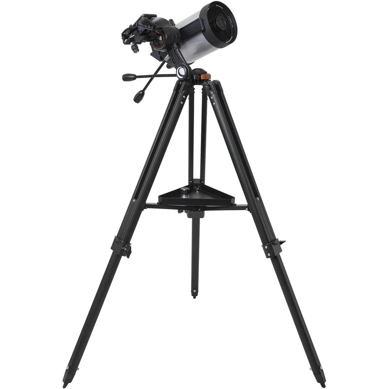 Celestron Starsense Explorer DX 5-inch SCT smartphone-enabled telescope with refractor design, mounted for stargazing and astronomy.