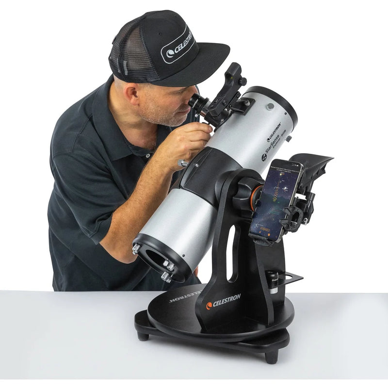 Celestron StarSense Explorer 114mm Dobsonian telescope with smartphone mount and app for easy stargazing and celestial observation.