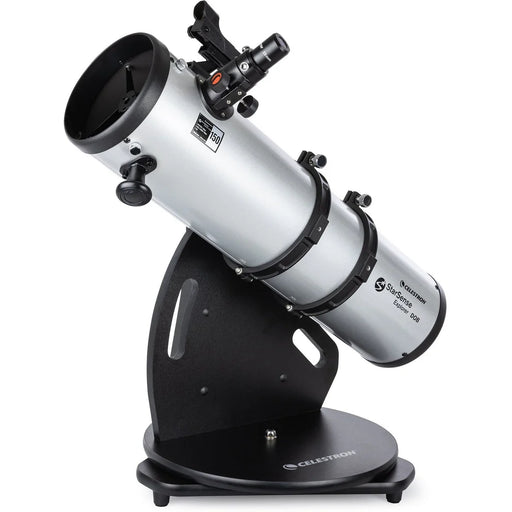 Celestron StarSense Explorer 150mm tabletop Dobsonian telescope with smartphone app, mounted on a wooden base for stargazing.