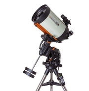 Celestron CGX 1100 EdgeHD Schmidt-Cassegrain telescope with mount, featuring a large optical tube and accessories for astrophotography.