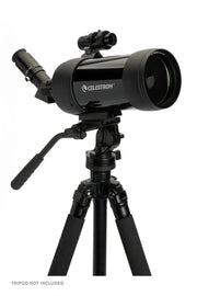 Celestron C90 Maksutov Cassegrain spotting scope with a sturdy tripod and lens cap, designed for detailed terrestrial and astronomical viewing.
