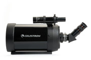 Celestron C5 SCT spotting scope mounted on tripod, compact telescope for terrestrial and astronomical viewing.