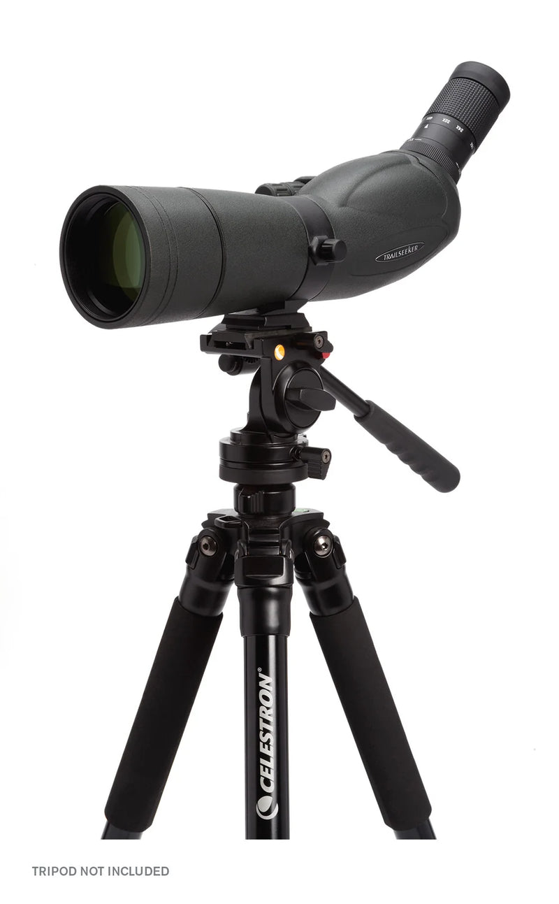 Celestron TrailSeeker 65mm angled spotting scope with 45-degree zoom lens, outdoor view through the binoculars, detailed focus.