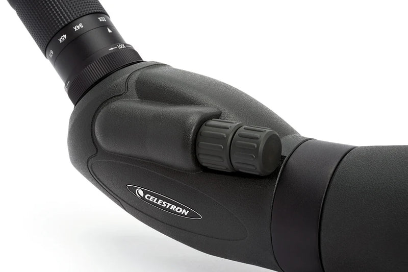 Celestron TrailSeeker 100mm angled spotting scope with 45-degree zoom eyepiece and sturdy tripod for outdoor wildlife viewing.
