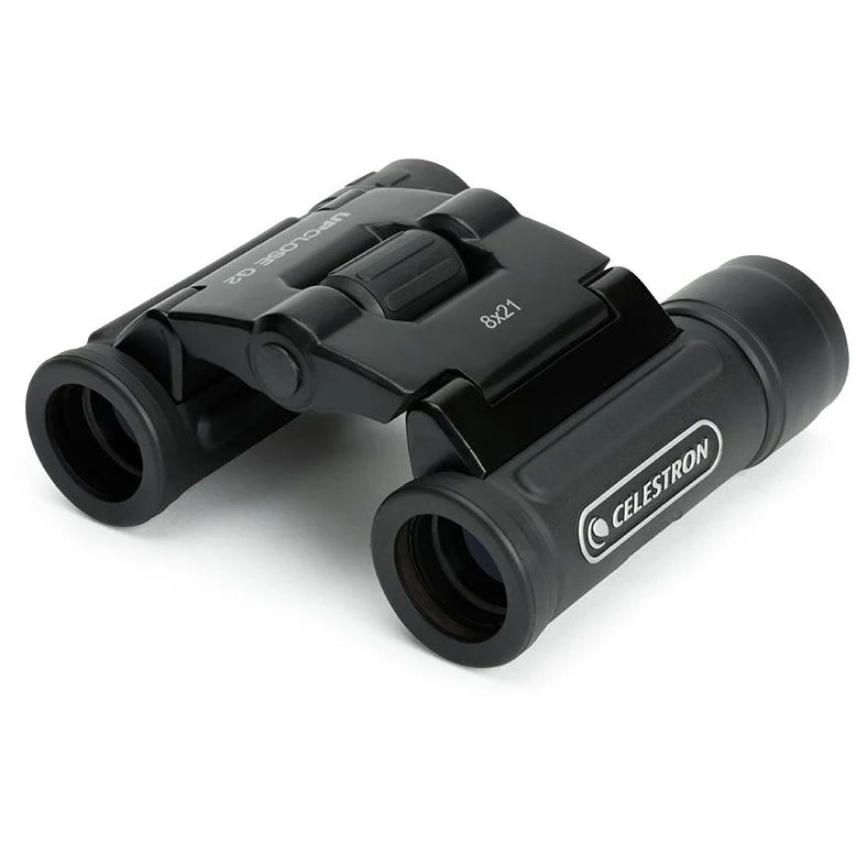 Celestron UpClose G2 8x21 roof binoculars with compact design and black exterior, suitable for outdoor viewing.