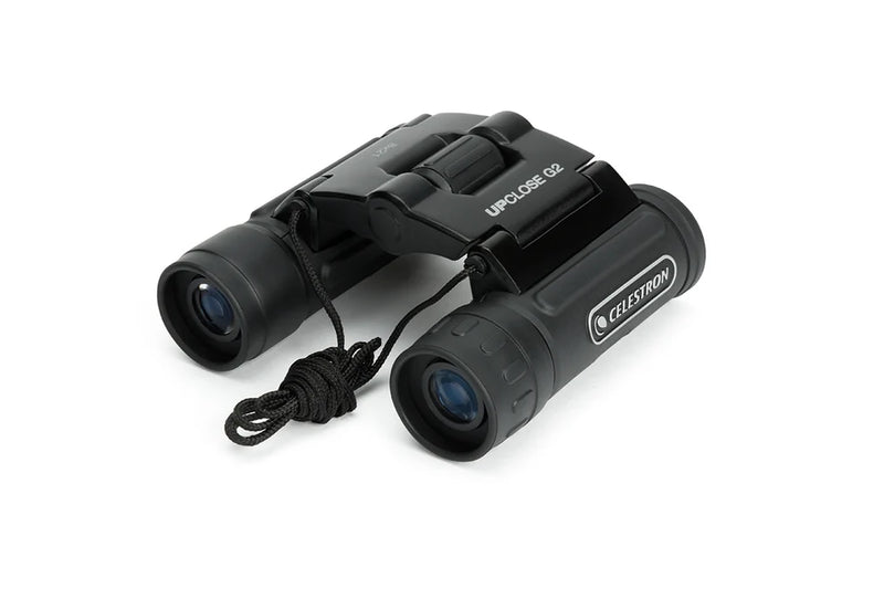 Celestron UpClose G2 8x21 roof binoculars with compact design and textured grip, suitable for outdoor and wildlife viewing.