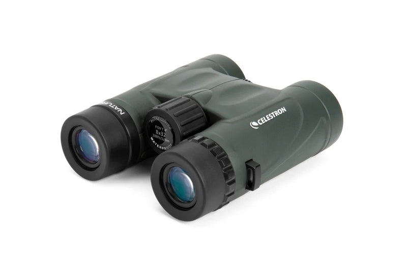 Celestron Nature DX 8x32 roof binoculars showing black body and eyepieces with a focus wheel, designed for outdoor viewing.