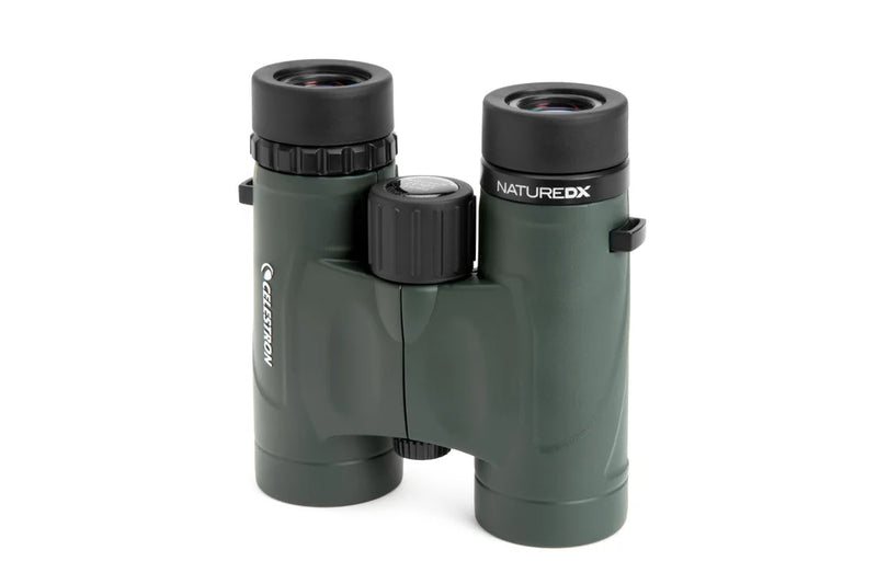 Celestron Nature DX 10x32 roof binoculars with black rubber armor and silver accents, showing the binoculars on a white background.