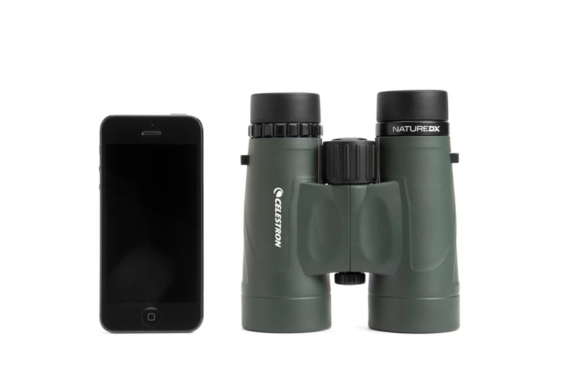 Celestron Nature DX Black 8x42 roof binoculars with textured grip and wide lenses, ideal for birdwatching and outdoor viewing.
