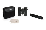 Celestron Outland X 8x25 roof binoculars with compact design, black body, and textured grip for outdoor wildlife viewing.