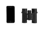 Celestron Outland X 8x25 roof binoculars with compact design, featuring black body and textured grips, ideal for outdoor viewing.